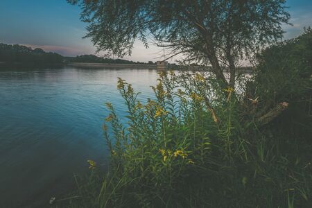 scenic nature in vivid colors in rural pondの写真素材