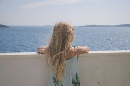 little girl with black henna tattoo in the shoulder