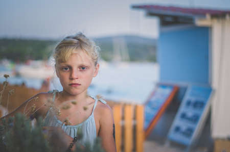 little girl with black henna tattoo in the shoulderの写真素材