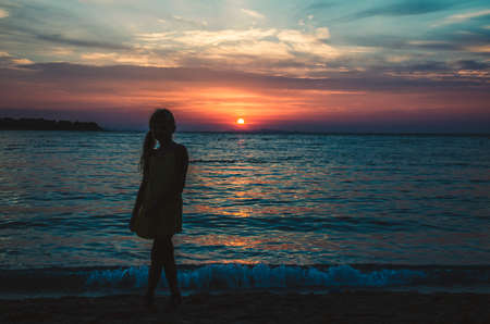 blue mediterranean sea in Croatia and orange sunset sceneryの写真素材