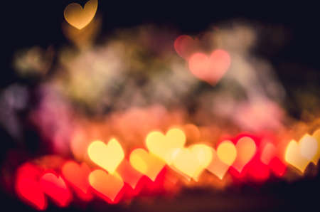 illuminated glittering bokeh with butterfly shape copy space backgroundの写真素材