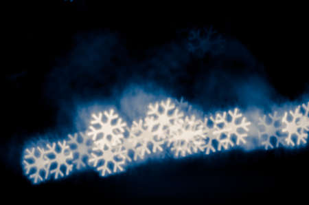 illuminated glittering bokeh with butterfly shape copy space backgroundの写真素材