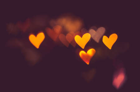illuminated glittering bokeh with butterfly shape copy space backgroundの写真素材