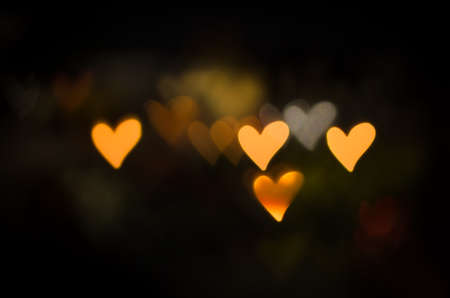 illuminated glittering bokeh with butterfly shape copy space backgroundの写真素材
