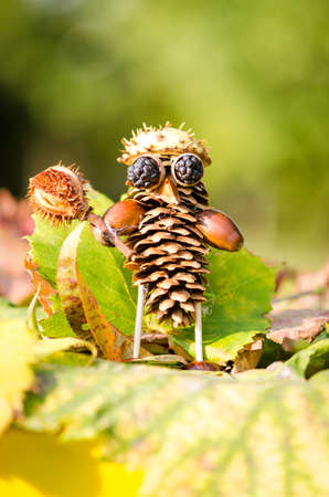 cute figures of pirate and hedgehog from autumnal fruits in vibrant autumnal colorsの写真素材