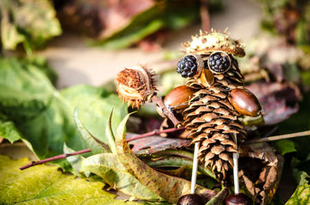 cute figures of pirate and hedgehog from autumnal fruits in vibrant autumnal colorsの写真素材