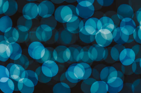gray neutral circles on black backgroundの写真素材