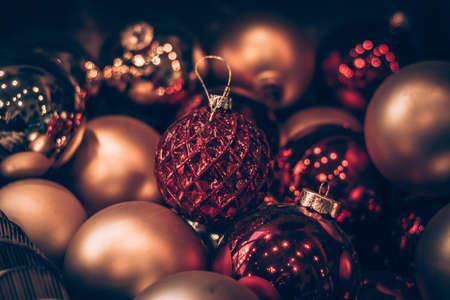 burning candles, scissors and green twigs components on wooden tableの写真素材