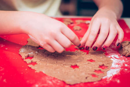 cookies and bell cooking shapes in christmas atmosphereの写真素材
