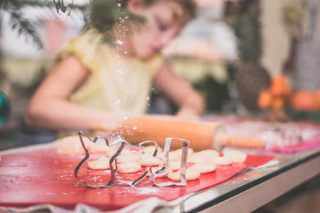 cookies and bell cooking shapes in christmas atmosphereの写真素材