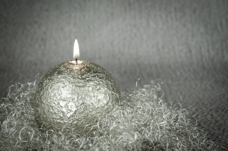 shining red christmas box with surprise inside in golden backgroundの写真素材