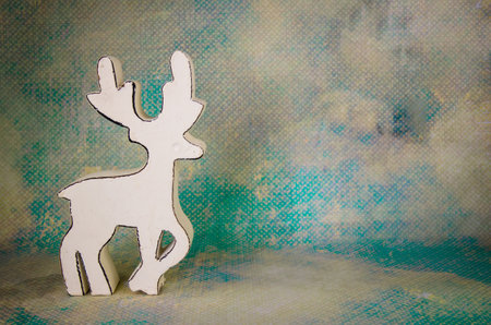 shining red christmas box with surprise inside in golden backgroundの写真素材