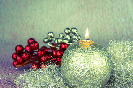 shining red christmas box with surprise inside in golden backgroundの写真素材