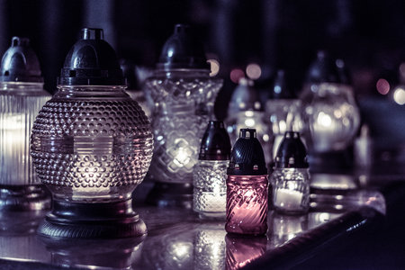 funeral concept with burning candles background