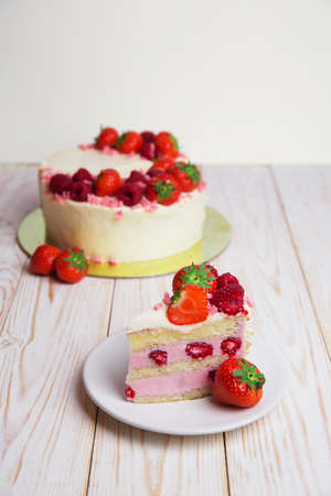 Tasty strawberry cream white chocolate yogurt cake homemade bakery  on white backgroundの写真素材