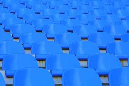 Blue empty stadium seatsの写真素材