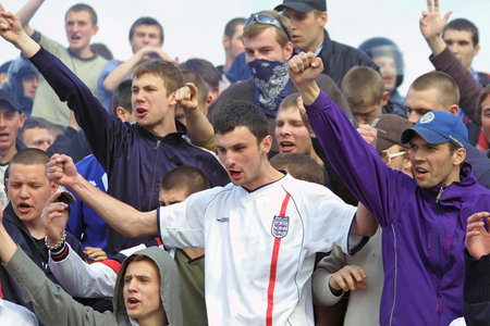 BORISPOL, UKRAINE - OCTOBER 4, 2009: FC Dynamo Kyiv ultra supporters show their support during...