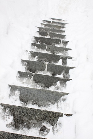 Concrete stairway covered with snowの写真素材