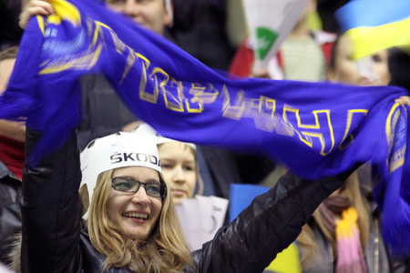 KYIV, UKRAINE - April 17, 2011: Ukrainian fans celebrate during IIHF Ice-hockey World Championship DIV I Group B game against Great Britain on April 17, 2011 in Kyiv, Ukraineのeditorial素材