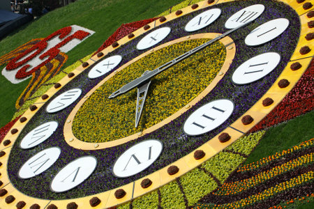 KYIV, UKRAINE - May 15, 2010: On the occasion of 65th Victory holiday flower clock is opened on May 15, 2010 in Kyiv, Ukraine. It is one of the biggest flower clock in the world (19,5m. in diameter)のeditorial素材
