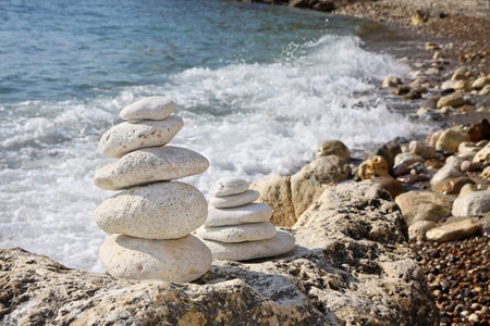 Stacks of stones on the beach. Crimea, Black sea, Ukraineの写真素材