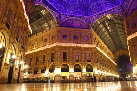 Galleria Vittorio Emanuele shopping Center in night. Milan, Italyのeditorial素材