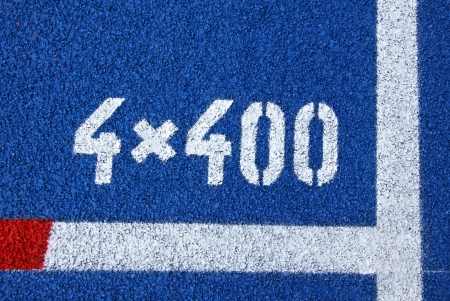 Painted marks at the starting grid of relay 4x400 race at the stadiumの写真素材