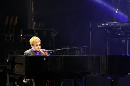 KYIV, UKRAINE - JUNE 30, 2012: Singer Sir Elton John performs onstage during charity Anti-AIDS concert at the Independence Square on June 30, 2012 in Kyiv, Ukraineのeditorial素材