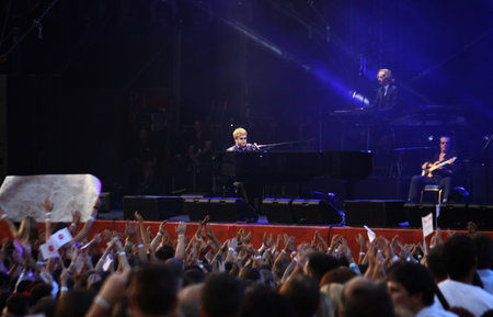 KYIV, UKRAINE - JUNE 30, 2012: Singer Sir Elton John performs onstage during charity Anti-AIDS concert at the Independence Square on June 30, 2012 in Kyiv, Ukraineのeditorial素材