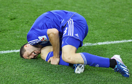 KYIV, UKRAINE - MAY 26, 2013: Yevhen Selin of Dynamo Kyiv reacts after injured during Ukraine Championship game against FC Metalurh Zaporizhya on May 26, 2013 in Kyiv, Ukraineのeditorial素材