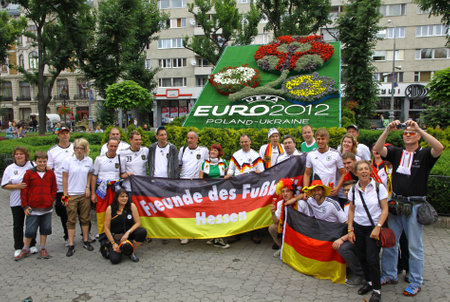 LVIV, UKRAINE - 9 JUNE, 2012  Germany football team supporters pose for a group photo on a street of Lviv city before UEFA EURO 2012 game against Portugal on 9 June, 2012 in Lviv, Ukraineのeditorial素材