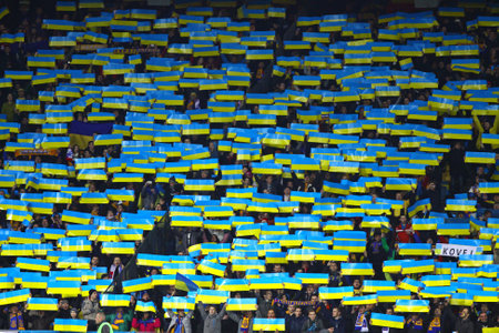 KYIV, UKRAINE - NOVEMBER 15, 2013  Ukraine national football team supporters show their support during FIFA World Cup 2014 qualifier game against France on November 15, 2013 in Kyiv, Ukraineのeditorial素材