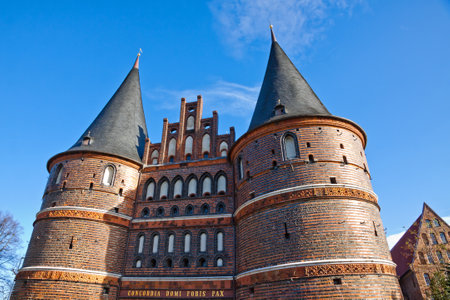 The Holsten Gate (Holstentor) in Lubeck old town, Schleswig-Holstein region, Germanyのeditorial素材