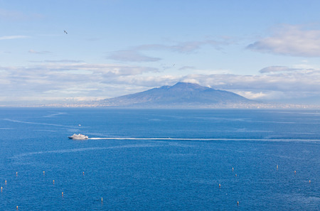 Picturesque morning view of Gulf of Naples and Mount Vesuvius on the background. View from Sorrento city Campania province Italyの写真素材