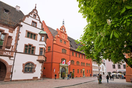 FREIBURG IM BREISGAU GERMANY  MAY 1 2013: Historical buildings at Rathausplatz Town hall square in Freiburg im Breisgau city BadenWurttemberg state Germanyのeditorial素材