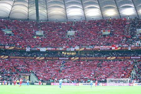 WARSAW, POLAND - MAY 27, 2015: FC Sevilla team supporters on tribunes of Warsaw National Stadium during UEFA Europa League Final game against FC Dniproのeditorial素材