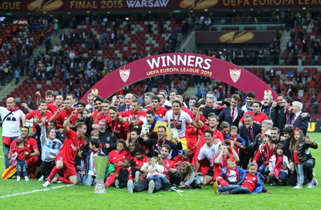 WARSAW, POLAND - MAY 27, 2015: FC Sevilla club - the Winner of the UEFA Europa League 2015 poses for a group photo with the Trophy at Warsaw National Stadiumのeditorial素材