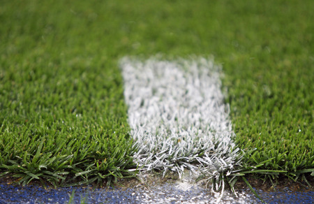 White mark on the green footballsoccer fieldの写真素材