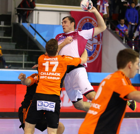 KYIV, UKRAINE - NOVEMBER 28, 2015: Sergey Shelmenko of Motor attacks during VELUX EHF Champions League 201516 Handball game against Kadetten Schaffhausenのeditorial素材