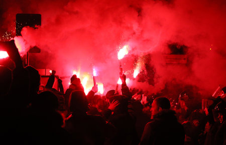 KYIV, UKRAINE - DECEMBER 9, 2015: FC Dynamo Kyiv ultras support their team on the road to NSC Olimpiyskyi stadium before UEFA Champions League game against Maccabi Tel-Avivのeditorial素材