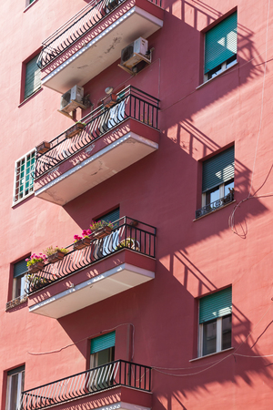 Italian style balconies of the building in Naples city, Italyの写真素材