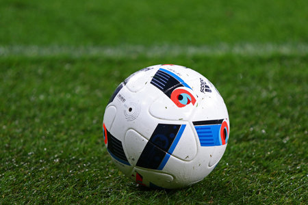 KYIV, UKRAINE - March 1, 2016: Adidas Beau Jeu - official match ball of the Euro-2016 on the grass during Ukrainian Cup quarterfinal first leg game FC Oleksandria vs FC Dynamo Kyiv in Kyivのeditorial素材