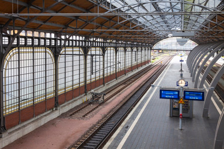 LUBECK, GERMANY - NOVEMBER 7, 2013: Lubeck Hbf railway station. Is the main railway station of Hanseatic city of Lubeck Schleswig-Holstein state,opened at 1908 and serving about 31000 visitors dailyのeditorial素材