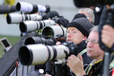 LVIV, UKRAINE - March 10, 2016: Football photographers at work during the UEFA Europa League Round of 16 game FC Shakhtar Donetsk vs RSC Anderlecht at Lviv Arena stadiumのeditorial素材