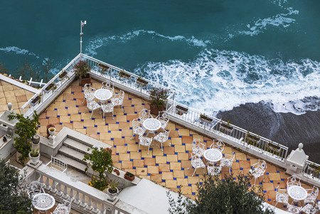 Empty open-air restaurant at Amalfi seacoast, Italyの写真素材