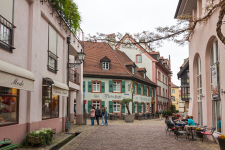 FREIBURG im BREISGAU, GERMANY - MAY 1, 2013: Old town street in Freiburg im Breisgau, a city in the south-western part of Germany in the Baden-Wurttemberg stateのeditorial素材