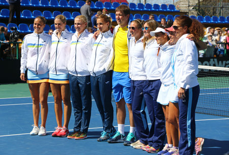 KYIV, UKRAINE - APRIL 17, 2016: Ukraine and Argentina National Teams pose for a group photo after BNP Paribas FedCup match against Argentina at Campa Bucha Tennis Club in Kyiv, Ukraineのeditorial素材