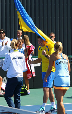 KYIV, UKRAINE - APRIL 17, 2016: Ukraine National Tennis Team react after BNP Paribas FedCup match against Argentina at Campa Bucha Tennis Club in Kyiv, Ukraineのeditorial素材