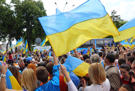 KYIV, UKRAINE - MAY 22, 2016: Supporters of the National Football Team of Ukraine at the Ceremony of the Departure for the European Championship 2016. Mykhailivska Square in Kyiv, Ukraineのeditorial素材