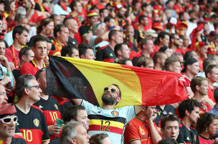 NICE, FRANCE - JUNE 22, 2016: Belgian fans show their support during the UEFA EURO 2016 game Sweden v Belgium at Allianz Riviera Stade de Nice, Nice, France. Belgium won 1-0のeditorial素材